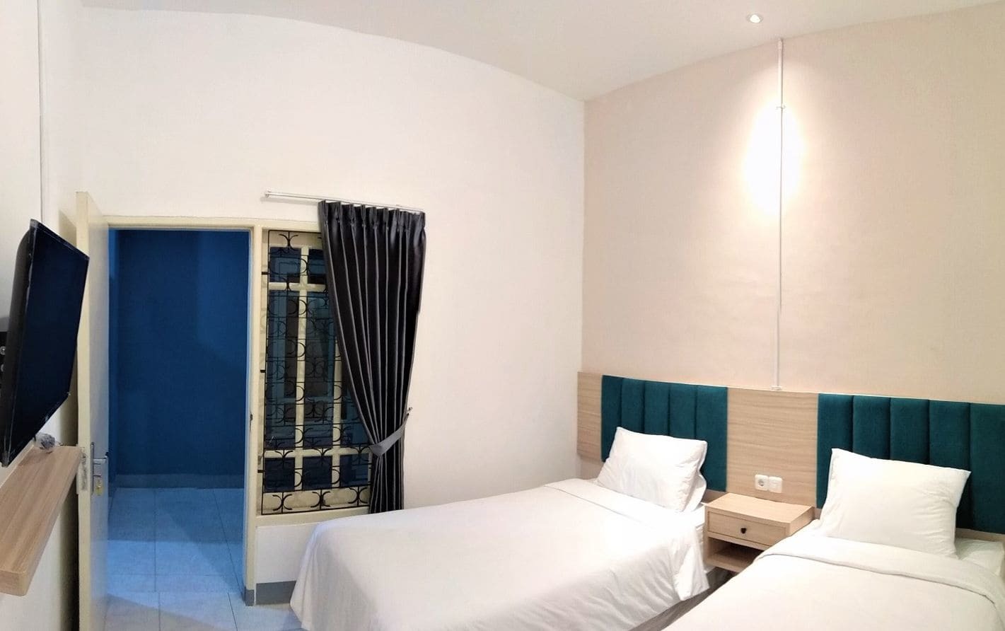 Kokonut Guesthouse スラバヤ エクステリア 写真